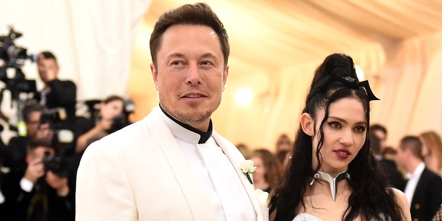 Elon Musk and Grimes attend the Heavenly Bodies: Fashion &amp; The Catholic Imagination Costume Institute Gala at The Metropolitan Museum of Art on May 7, 2018.