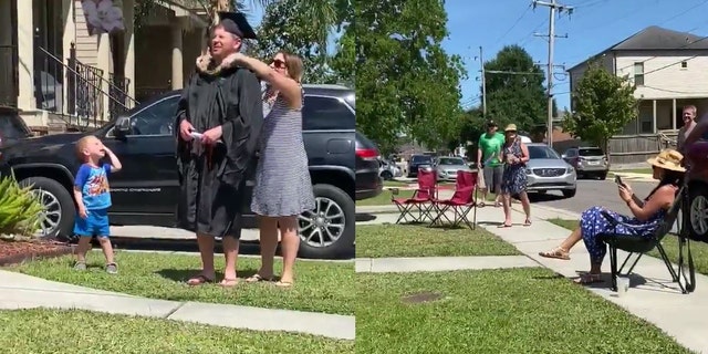 From a safe social distance, neighbors in lawn chairs cheered and sang the tune of the traditional graduation hymn “Pomp and Circumstance."