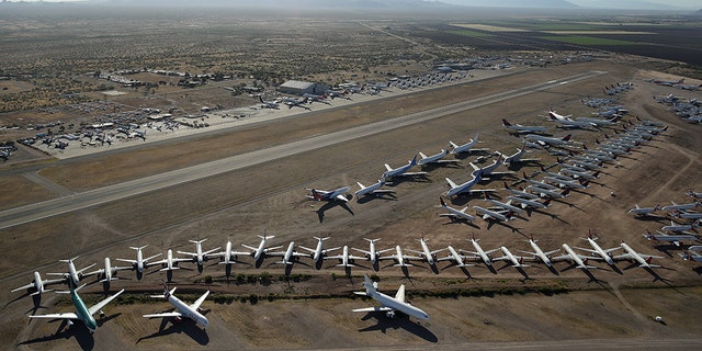 MARANA, ARIZONA - MAY 16: Decommissioned and suspended commercial aircrafts are seen stored in Pinal Airpark on May 16, 2020 in Marana, Arizona. Pinal Airpark is the largest commercial aircraft storage facility in the world, currently holding increased numbers of aircraft in response to the coronavirus COVID-19 pandemic. (Photo by Christian Petersen/Getty Images)