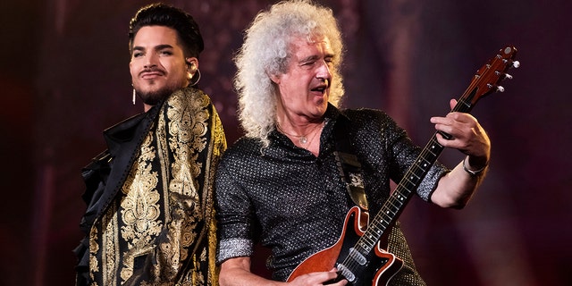Adam Lambert, left, and Brian May, of Queen, perform at the Global Citizen Festival in New York. Lambert and May, along with bandmate Roger Taylor, recently gathered virtually to record a new version of the Queen classic, “We Are the Champions.” “You Are the Champions” was released early Friday on all streaming and download services, with proceeds going to the World Health Organization’s COVID-19 Solidarity Response Fund. 