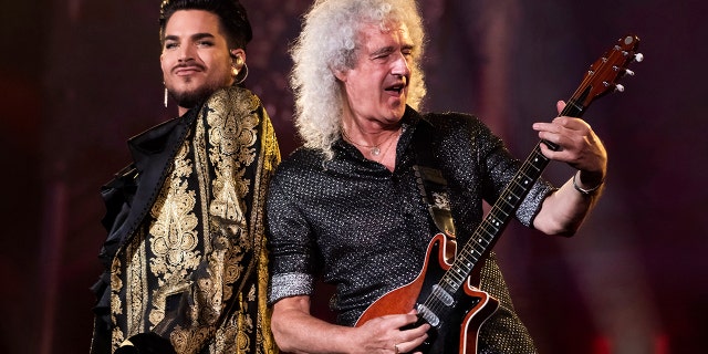 Adam Lambert, left, and Brian May, of Queen, perform at the Global Citizen Festival in New York. Lambert and May, along with bandmate Roger Taylor, recently gathered virtually to record a new version of the Queen classic, “We Are the Champions.” “You Are the Champions” was released early Friday on all streaming and download services, with proceeds going to the World Health Organization’s COVID-19 Solidarity Response Fund.