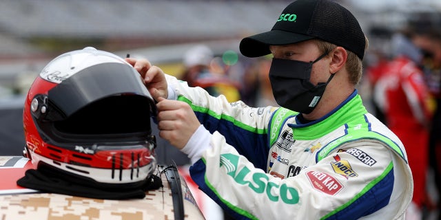 Tyler Reddick, driver of the #8 Alsco Uniforms Chevrolet, stands on the grid during qualifying for the NASCAR Cup Series Coca-Cola 600 at Charlotte Motor Speedway on May 24, 2020 in Concord, North Carolina. (Photo by Chris Graythen/Getty Images)
