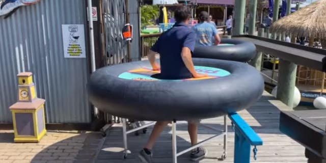 The “social distancing tables” were designed by Revolution Event Design and Production, to give patrons a way to “drink safely” and stay “six feet apart” from other guests.