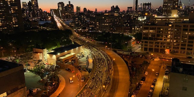 Protestors coming off the Brooklyn Bridge from Manhattan.