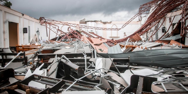 In this photo provided by office of Eastern Samar provincial Gov. Ben Evardone, remains of a damaged structure lies in Eastern Samar province, eastern Philippines on Friday May 15, 2020.