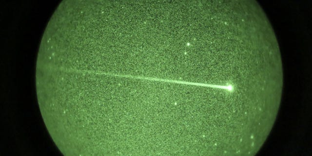 An Air Force AC-130W assigned to Joint Special Operations Air Component marks a target with an infrared laser during an aviation operation in support of sea control training evolution May 19, 2020.