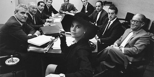 Natalie Wood in a business meeting.