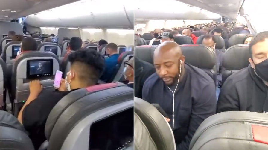 American Airlines passenger complains of overcrowded flight from