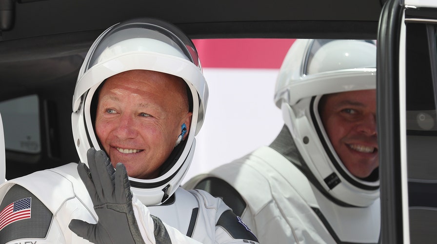 NASA astronauts Behnken and Hurley launch into orbit