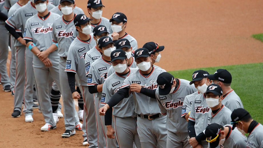 Play ball: Korean baseball league begins in empty stadiums