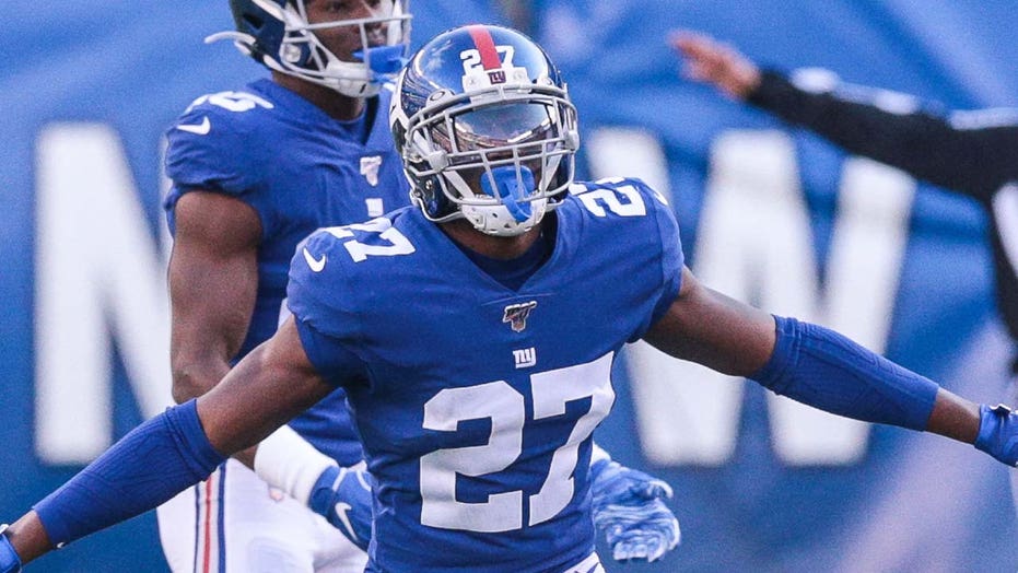 Giants' DeAndre Baker charged with four counts of armed robbery in ...