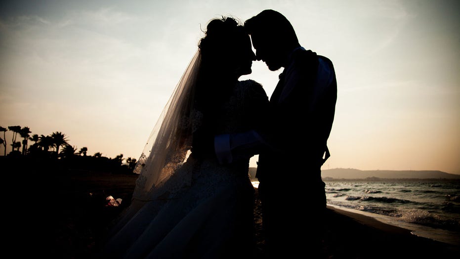 https://a57.foxnews.com/static.foxnews.com/foxnews.com/content/uploads/2020/05/931/524/Silhouette-Wedding-iStock.jpg
