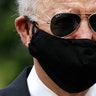 Presumptive Democratic presidential nominee Joe Biden wears a face mask to protect against the spread of the coronavirus after placing a wreath at the Delaware Memorial Bridge Veterans Memorial Park, in New Castle, Del., May 25, 2020.