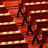 Tea hostesses prepare for the closing session of the Chinese People's Political Consultative Conference at the Great Hall of the People in Beijing, May 27, 2020. 