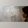 Protestors enter a burning Minneapolis 3rd Police Precinct, Thursday, May 28, 2020, in Minneapolis. Protests over the death of George Floyd, a black man who died in police custody Monday, broke out in Minneapolis for a third straight night.