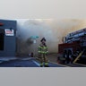A firefighter pauses Thursday, May 28, 2020, in St. Paul, Minn.