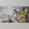 St. Paul firefighters continued to battle the fires along University Avenue, Friday, May 29, 2020, in St. Paul.