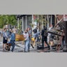 Hundreds of volunteers showed up to clean along University Avenue, organized by Hamline Midway Coalition, Friday, May 29, 2020, in St. Paul, Min., following a night of unrest.