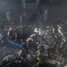 Rescue workers search for victims at the site after a Pakistan International Airlines aircraft crashed at a residential area in Karachi on May 22, 2020. A Pakistani passenger plane with nearly 100 people on board crashed into a residential area of the southern city of Karachi. (Photo by Asif HASSAN / AFP) 
