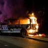 A NYPD van burns in Brooklyn following a protest outside Barclays Center Friday.