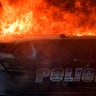 An Atlanta police vehicle on fire.