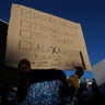 Protesters gather outside U.S. Bank Stadium in Minneapolis Friday.