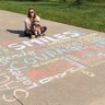 The chalk art of Lainey and family in Lakewood Colorado encouraging everyone to hang in there