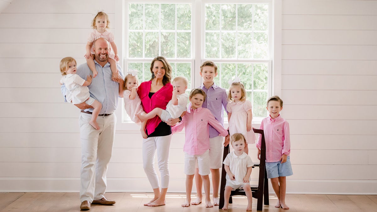Eric and Courtney with their nine kids. 