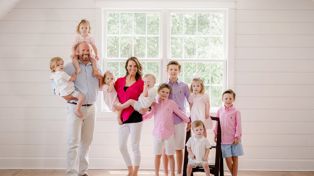 Eric and Courtney with their nine kids.