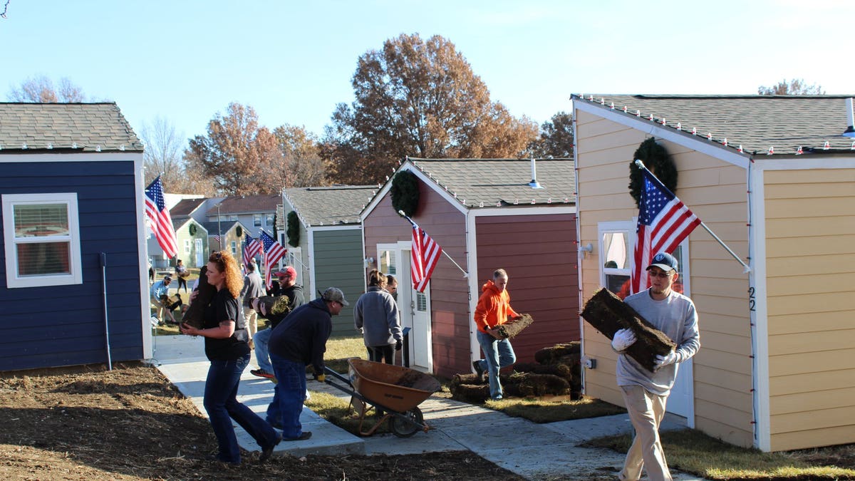 Volunteers working at VCP Village.