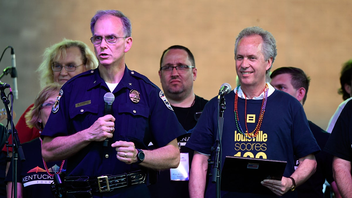 Louisville Police Chief Steve Conrad, left, seen speaking here in 2016, has been fired. (Stephen J. Cohen/Getty Images, File)