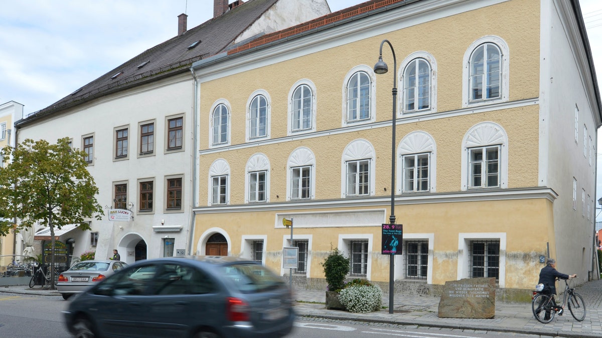 This Sept. 27, 2012 file picture shows an exterior view of Adolf Hitler's birth house, front, in Braunau am Inn, Austria. The birth house of Adolf Hitler will become a police station Austrian interior minister Karl Nehammer said, as he presents the redesign of the building at a news conference in Vienna Tuesday, June 2, 2020. 