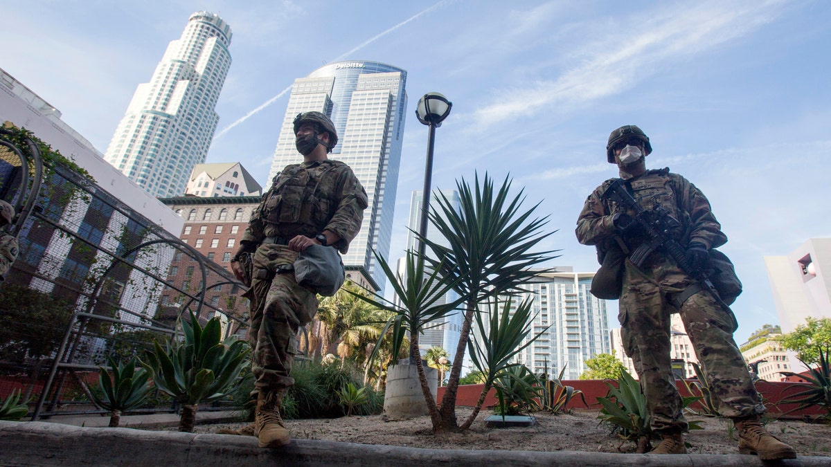 Members of the California National Guard patrol in Los Angeles on May 31, 2020.  (AP Photo/Ringo H.W. Chiu, File)
