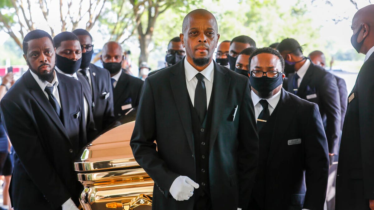 Pallbearers bringing the coffin into The Fountain of Praise church in Houston for the funeral for George Floyd on Tuesday.