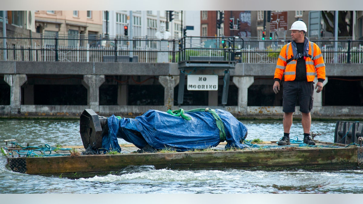 The council says it has been taken to a "secure location" and will end up in a museum. Colston built a fortune transporting enslaved Africans across the Atlantic, and left most of his money to charity. (Bristol City Council via AP)