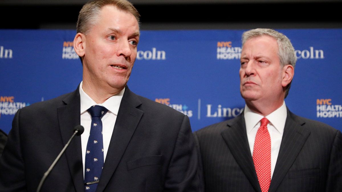 New York City Police Commissioner Dermot Shea, left, speaks alongside Mayor Bill de Blasio during a news conference in New York. New York City’s police department is disbanding NYPD's anti-crime unit, the controversial unit involved in Eric Garner’s 2014 chokehold death, Commissioner Dermot Shea said Monday, June 15, 2020 amid a nationwide reckoning for policing in the wake of George Floyd’s death last month in Minneapolis .(AP Photo/John Minchillo, File)