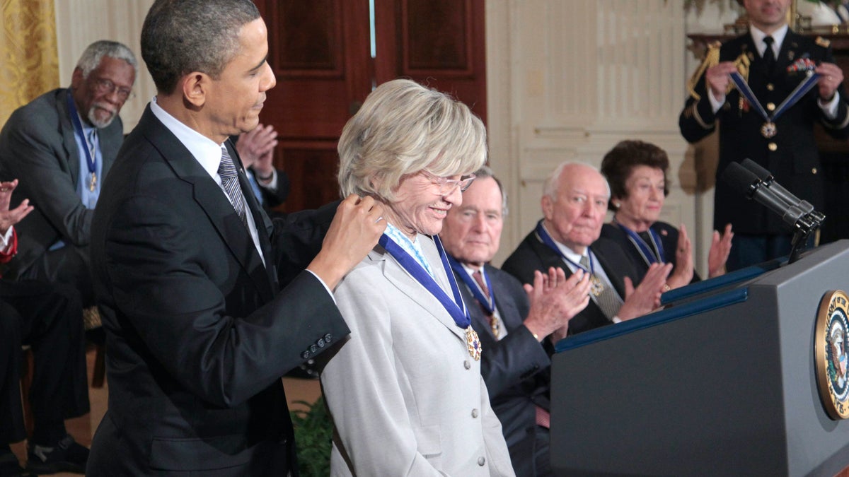 FILE - In this Feb. 15, 2011 file photo, President Barack Obama presents a Medal of Freedom to Jean Kennedy Smith during a ceremony in the East Room of the White House in Washington. Jean Kennedy Smith, the youngest sister and last surviving sibling of President John F. Kennedy, died at 92, her daughter confirmed to The New York Times, Wednesday, June 17, 2020. (AP Photo/Pablo Martinez Monsivais)