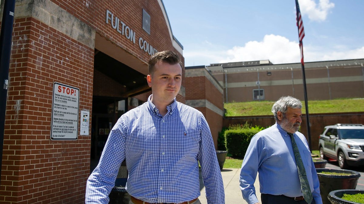 Atlanta Police officer Devin Brosnan walks out following his release from the Fulton County Jail on Thursday last week in Atlanta. Authorities have charged him with four counts, including aggravated assault in the shooting death of Rayshard Brooks. The Fulton County District Attorney said Brosnan stood on Brooks' shoulder as he struggled for his life. (AP Photo/Brynn Anderson)