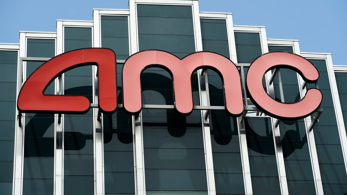 FILE - In this April 29, 2020 file photo, the AMC sign appears at AMC Burbank 16 movie theater complex in Burbank, Calif. 