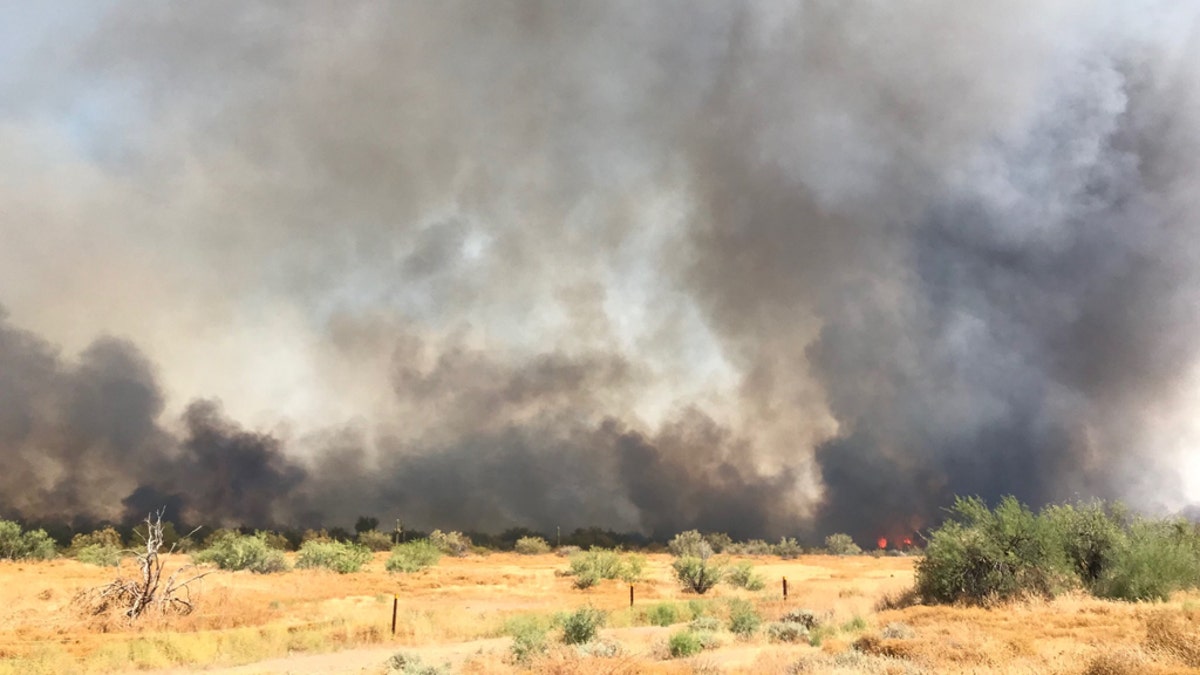 All forward progress on the Aquila Fire has been stopped after it burned more than 800 acres in north Phoenix on Tuesday, according to officials.