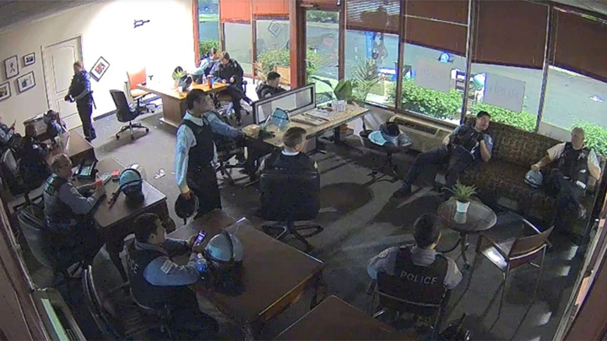 Mayor Lightfoot said the images show the individuals taking a break in Rush’s office while small businesses were looted and burned -- and while their fellow officers were outside “getting bottles thrown at their heads” by rioters. (City of Chicago)