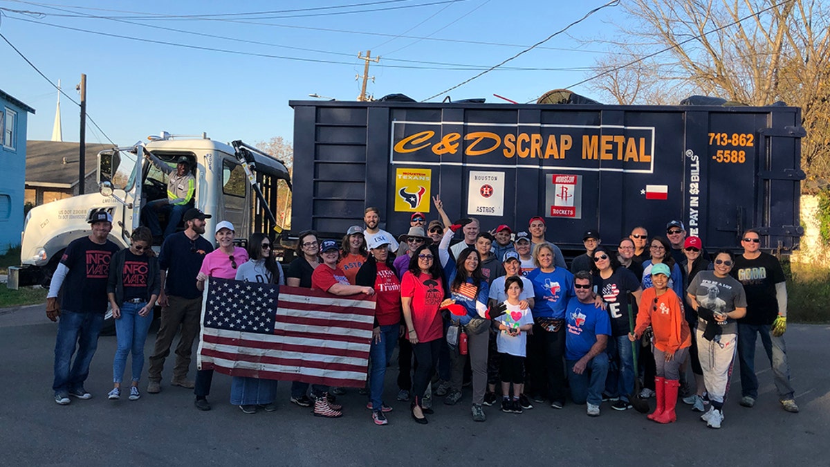 Volunteers took a group photo after cleaning up Houston.