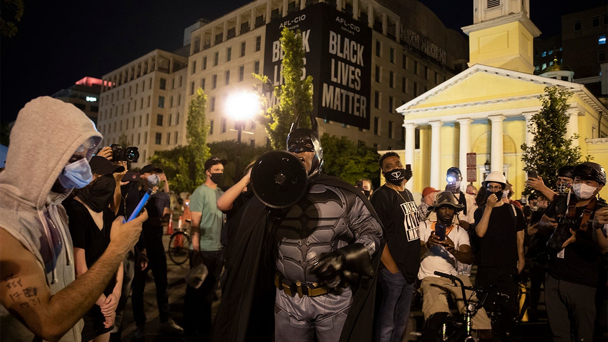 Protesters gather on Black Lives Matter Plaza after they attempted to pull down the statue of Andrew Jackson in Lafayette Square near the White House on June 22, 2020 in Washington, DC. Protests continue around the country over the deaths of African Americans while in police custody.