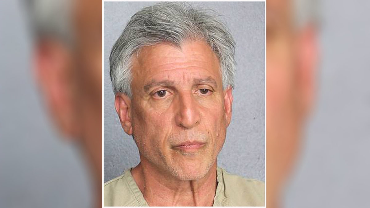 Daniel Dovi, 63, of Sellersville, Penn., has been charged in connection to an aggravated assault and high-speed chase in Broward County on Monday. Police are investigating whether he is tied to a double-homicide after two bodies were found on a Fort Lauderdale beach Tuesday morning. (Broward County Sheriff's Department)
