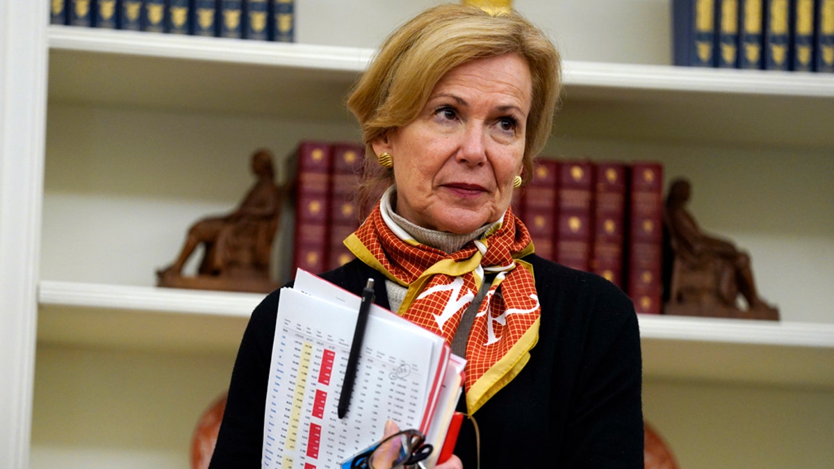 White House coronavirus response coordinator Dr. Deborah Birx listens in the Oval Office of the White House, May 6, 2020, in Washington.