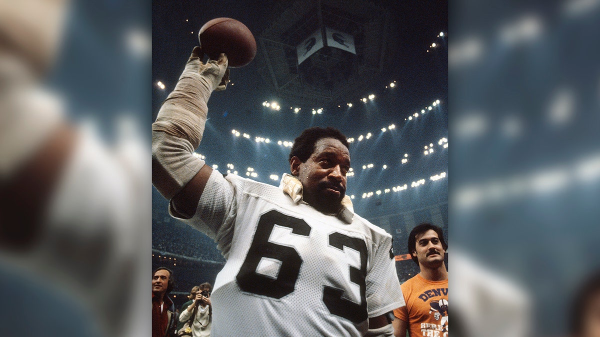 Gene Upshaw #63 of the Oakland Raiders celebrates after they defeated the Philadelphia Eagles in Super Bowl XV at the Louisiana Superdome January 25, 1981 in New Orleans, Louisiana. The Raiders won the Super Bowl 27-10. (Photo by Focus on Sport/Getty Images)