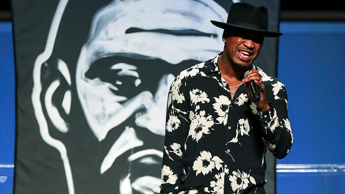 Singer Ne-Yo performs a song during the funeral for George Floyd on Tuesday, June 9, 2020, at The Fountain of Praise church in Houston.