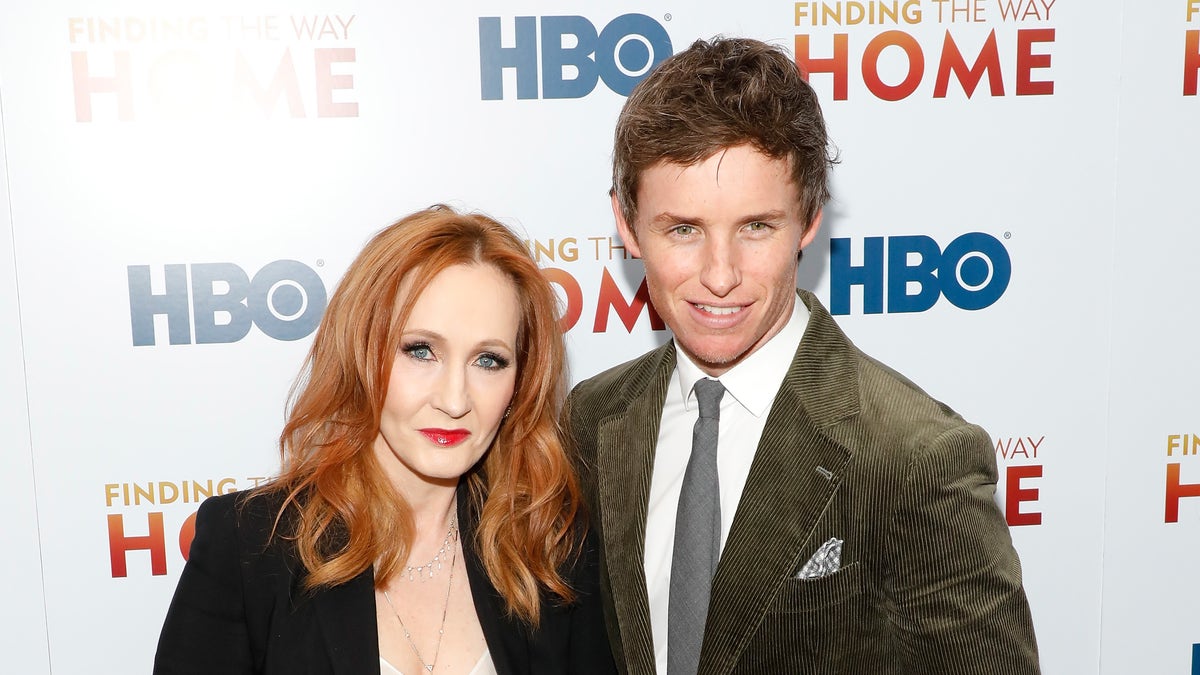 J.K. Rowling, left, and Eddie Redmayne, right, attend the premiere of "Finding the Way Home" at Hudson Yards on December 11, 2019 in New York City.?