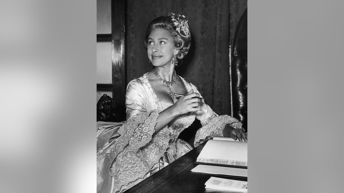 Princess Margaret (1930 - 2002) wearing an eighteenth-century ball gown and a wig to the Georgian Ball, a charity event in aid of the Friends of St. John's at the Mansion House, London, 1st July 1964.