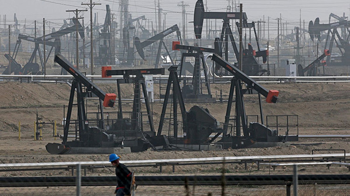 Pumpjacks operate at the Kern River Oil Field, Friday, Jan. 16, 2015, in Bakersfield, Calif. California regulators authorized oil companies more than 2,500 times to inject wastewater and other production-related fluids into federally protected aquifers potentially suitable for drinking and watering crops in the nation’s agricultural center, state records show. (AP Photo/Jae C. Hong)